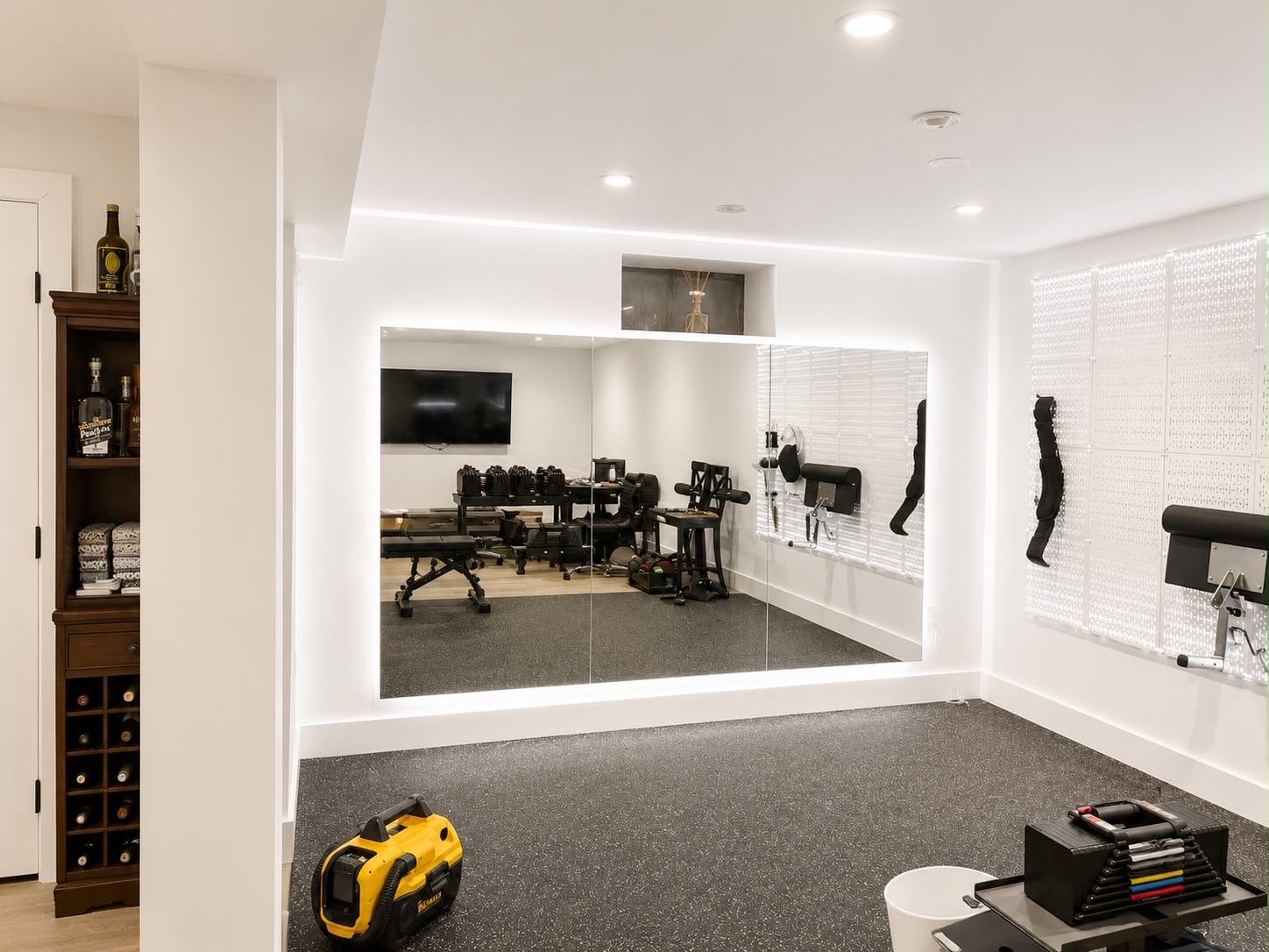 Home gym mirror wall by Horus Glassworks — Custom mirror installation