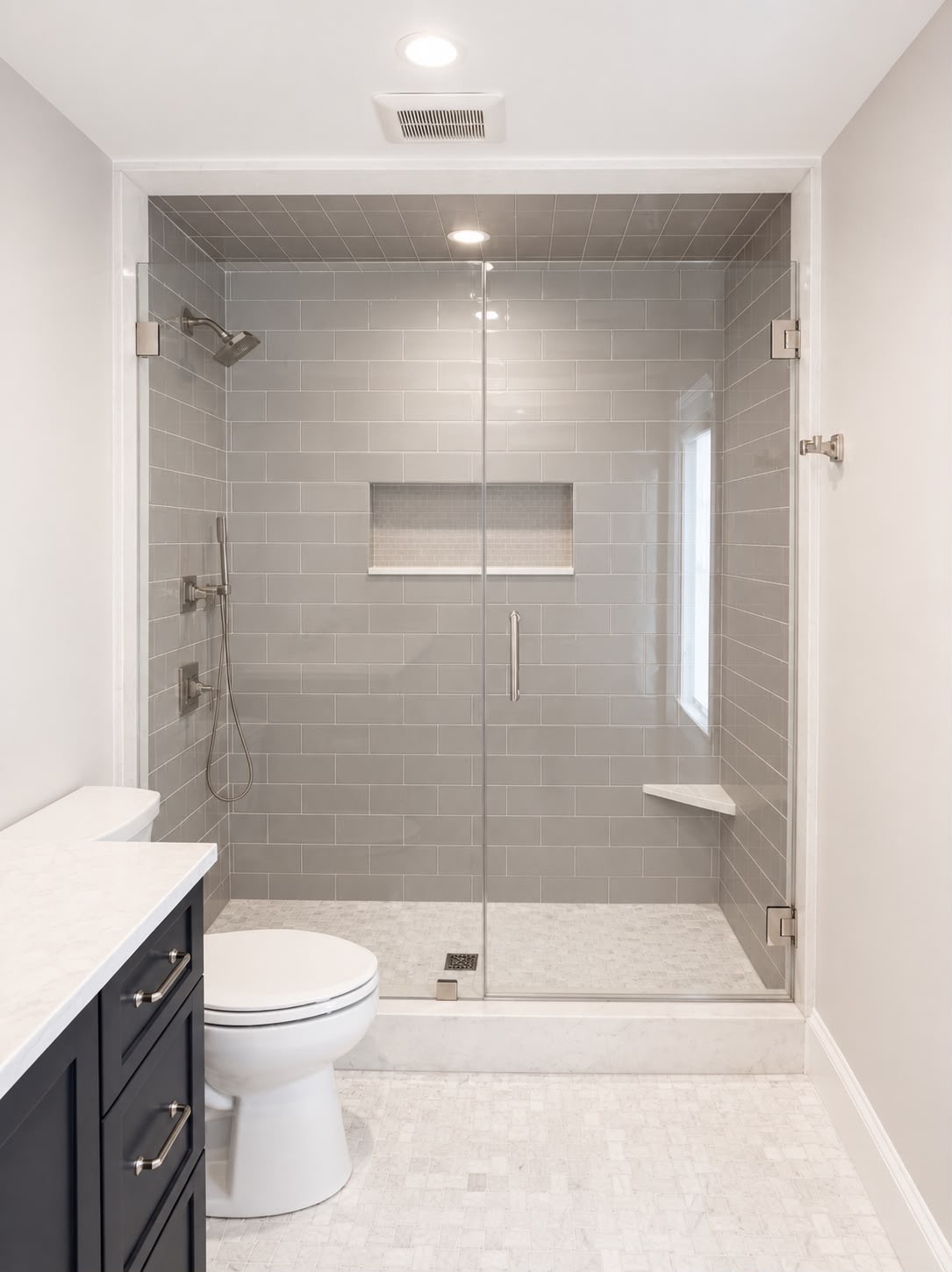 Gray tile enclosure by Horus Glassworks — Frameless door and panel